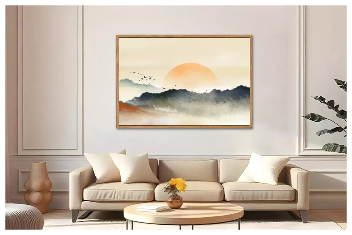 Le même paysage à l’aquarelle en caisse américaine bois clair au-dessus d’un canapé beige, mur à moulures